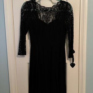 Francesca’s Black mini dress with lace top. Size medium.